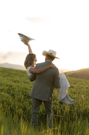 Happy wedding couple in Montana at the 1889 barn.png