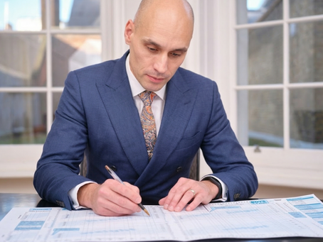 Paediatric dietitian Rick Miller completes a child growth chart 