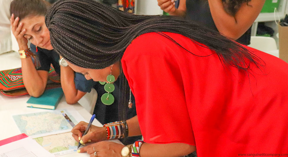 Women working together on a plan