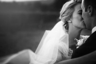 Bride and groom kiss