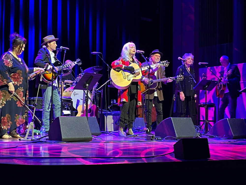 Andrea Zonn, Thomm Jutz, Lynn Williams on drums, Ms. Harris, Buddy Miller, Fayssoux and Eric Brace on guitar. (Photo by Alan Richard)
