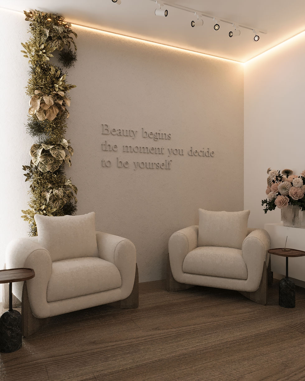 Cozy seating area inside Beauty Point salon, featuring two plush armchairs, side tables, floral arrangements, and a wall with