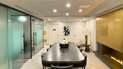 Commercial glass boardroom installation in modern Ontario office building with frameless glass walls and meeting room enclosure.
