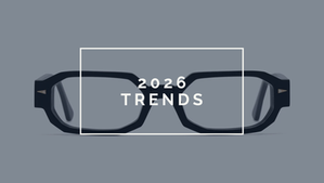 Minimal editorial graphic featuring angular black acetate eyewear against a muted grey background with bold white typography reading “2026 Trends”. Designed for CBTR Opticians’ blog post and social content exploring 2026 eyewear fashion trends, quiet luxury and modern frame design.