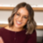 Optometrist Hayley smiling in headshot at CBTR Opticians, Beaconsfield