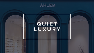 AHLEM eyewear boutique exterior with teal arched storefront and minimalist interior display of luxury optical frames