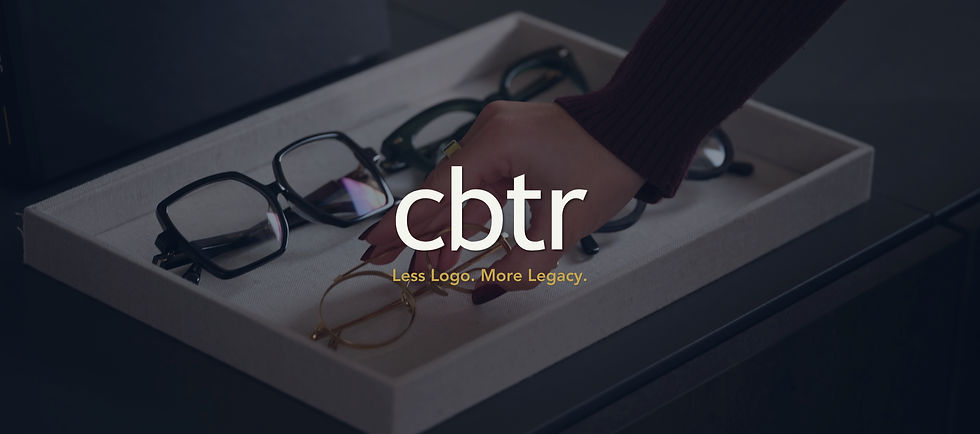 Dark luxury campaign image for CBTR Opticians featuring a curated eyewear tray with handcrafted frames and subtle low-light styling. Central CBTR branding with the tagline “Less Logo. More Legacy.” reflecting the shift toward quiet luxury, craftsmanship and understated eyewear design.