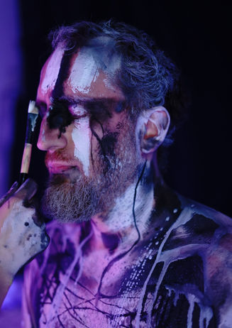 alternative make-up artist Ironfaces body painting on a man, male viking make up