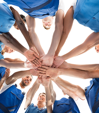 Hands reaching into a circle 