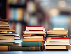 stack-books-with-library-scene.jpg