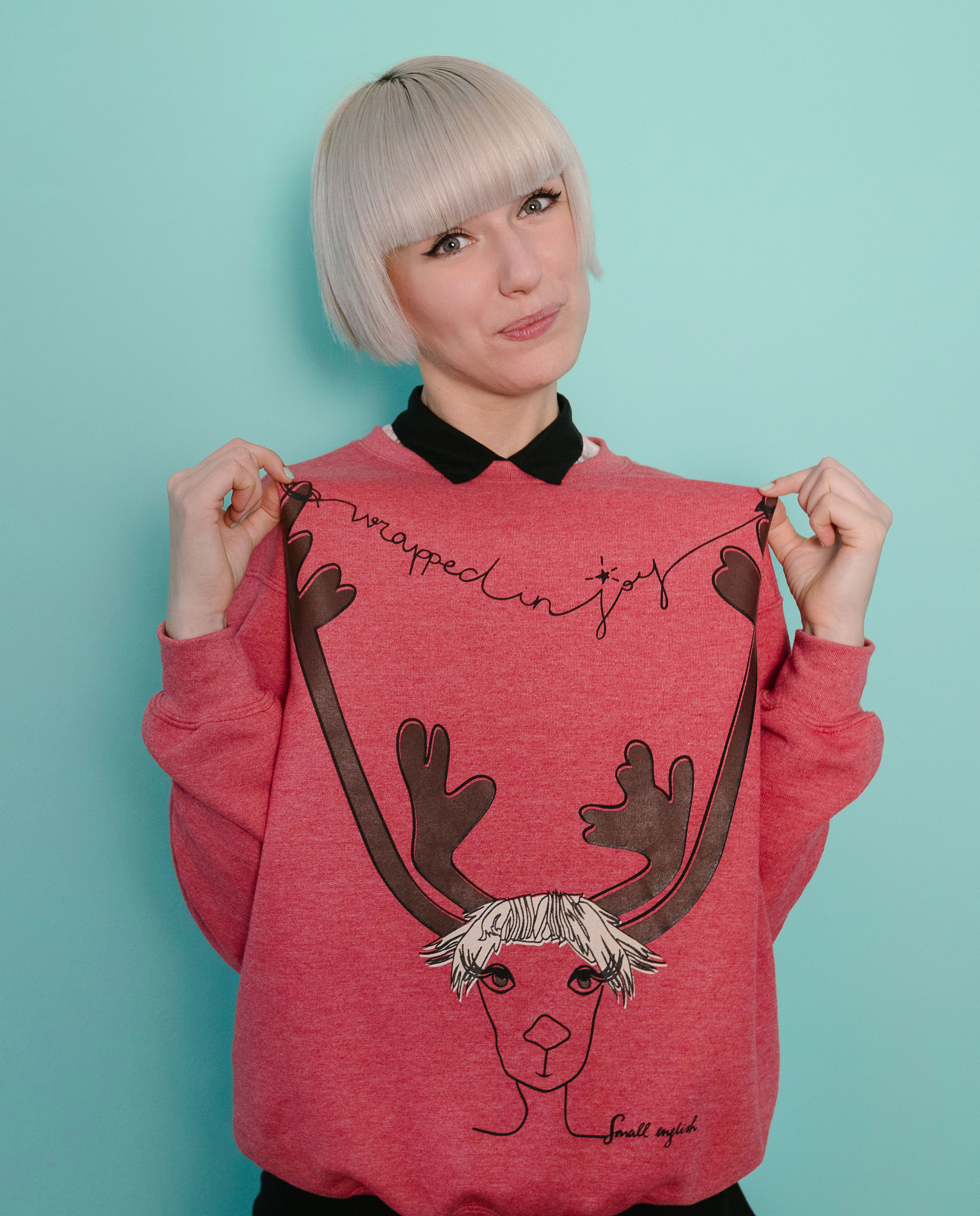 WRAPPED IN JOY SWEATER