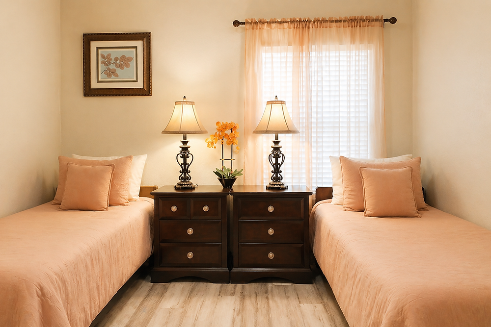 Twin bedroom with two lamps and nightstands