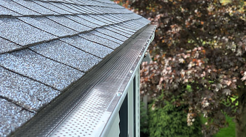 New seamless gutters with leaf guard gutter protection