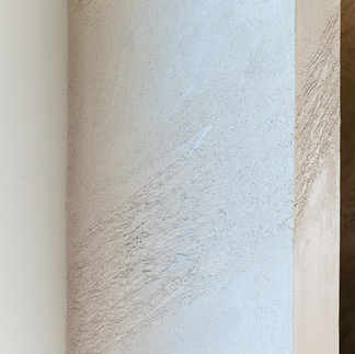 White split stone polished plaster fireplace