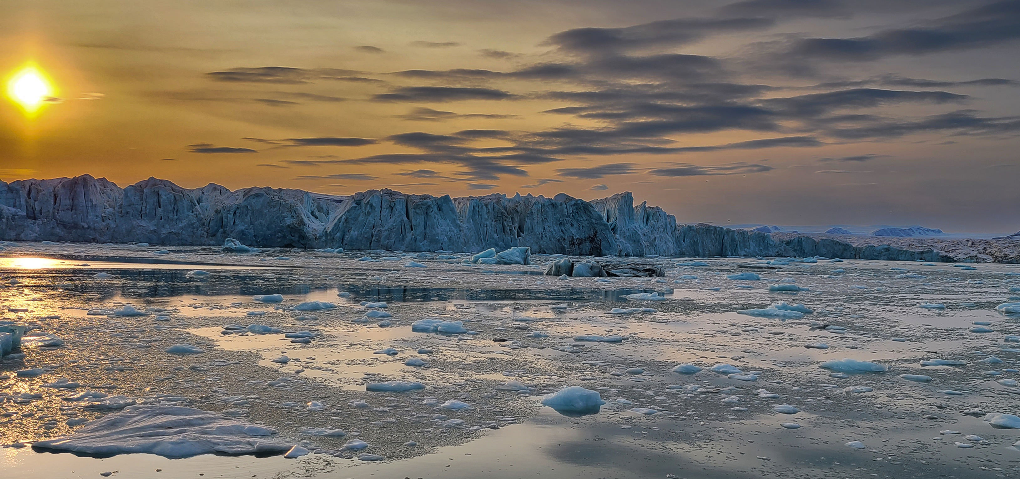 Striking Sun Over Craggy Glacier