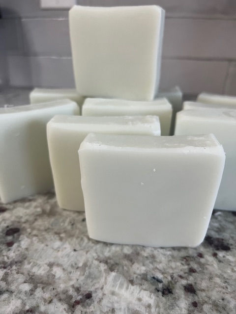 Thumbnail: Row of handcrafted French Clay & Herb soap bars made with green French clay, displayed upright on a speckled countertop.  If