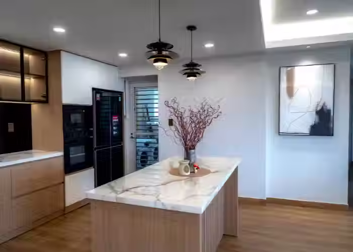 A modern HDB kitchen with marble countertop