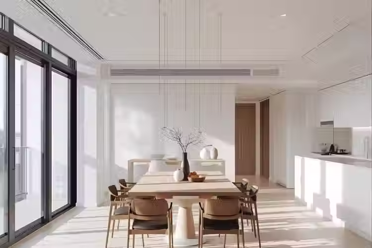 A minimalist condo kitchen with brown dining chairs