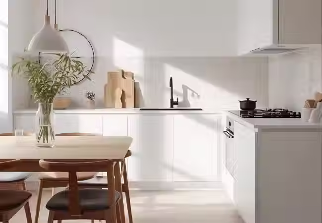 A modern Scandinavian kitchen with dining table