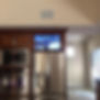 32 in. Samsung above refrigerator built into cabinets.