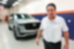 Bill Fetter, founder of Immaculate Paint Protection, in front of a Cadillac Escalade protected with SunTek Reaction PPF and Gyeon Ceramic Coating.