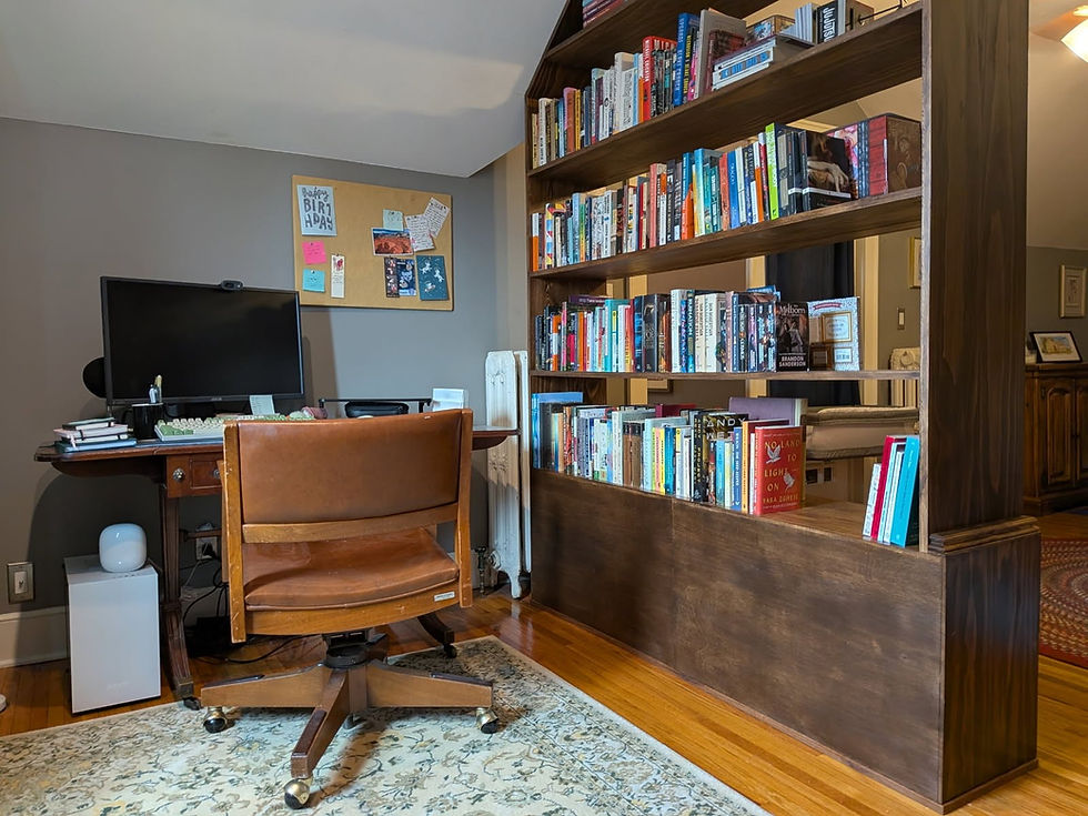 Custom wood bookcase and room divider in a home office