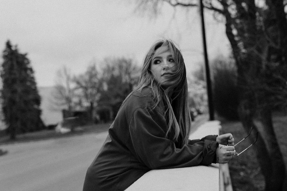 Photo of Delaney Denham. Premier Canadian Photographer based in Saskatchewan. She shoots Couples, Engagements, Weddings
