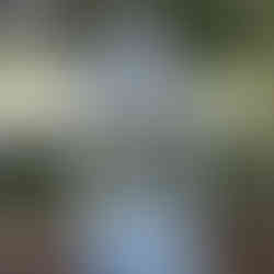 Elegant white Lantern Wishing Well illuminated at night