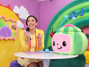 In CoComelon’s live-action series “The Melon Patch,” beloved teacher Ms. Appleberry (Allie Rivera Quiñonez, left) leads activities developed by early childhood learning experts