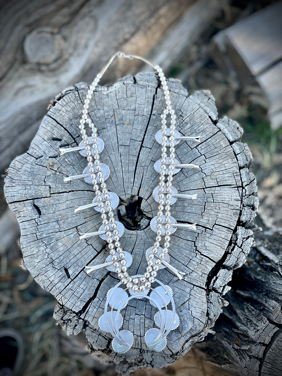 Thumbnail: Sterling silver Squash Blossom by Tomás Garcia