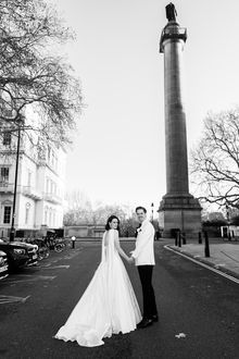 Couple looking back at the camera in London central 