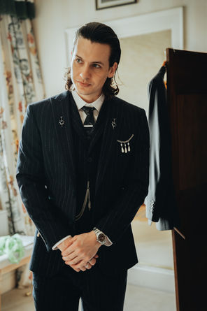 groom posing at Carlton Towers