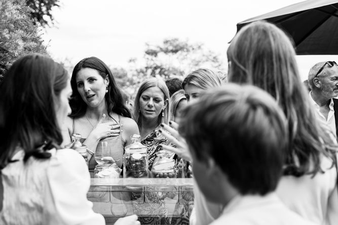 guests queueing up fro ice cream at wedding 