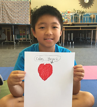 Youths develop caring attitudes with SCHOOL Yoga & Mindfulness lessons.