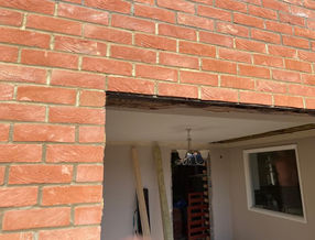 Bricklaying Filling Hole in Wall in Colchester