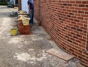 Repairing Garden Brick Wall in Colchester