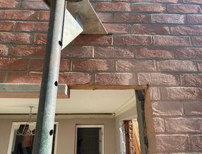 Bricklaying Filling Hole in Wall in Colchester