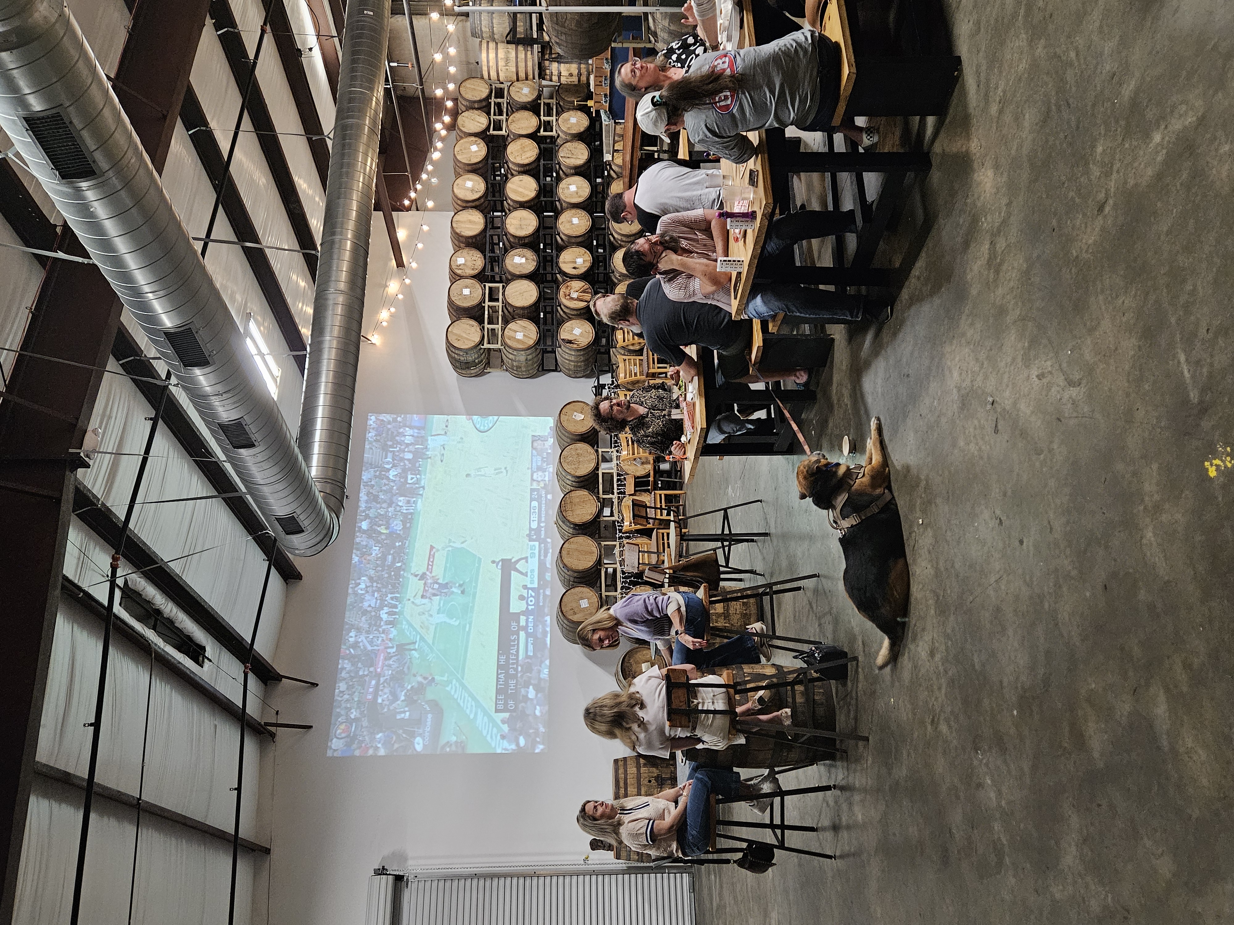 Guests seated in the projection room at William Price Distilling in Houston.