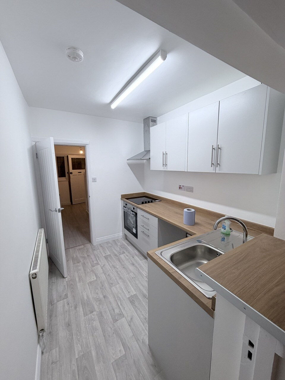 After - new fitted kitchen with wall and base units