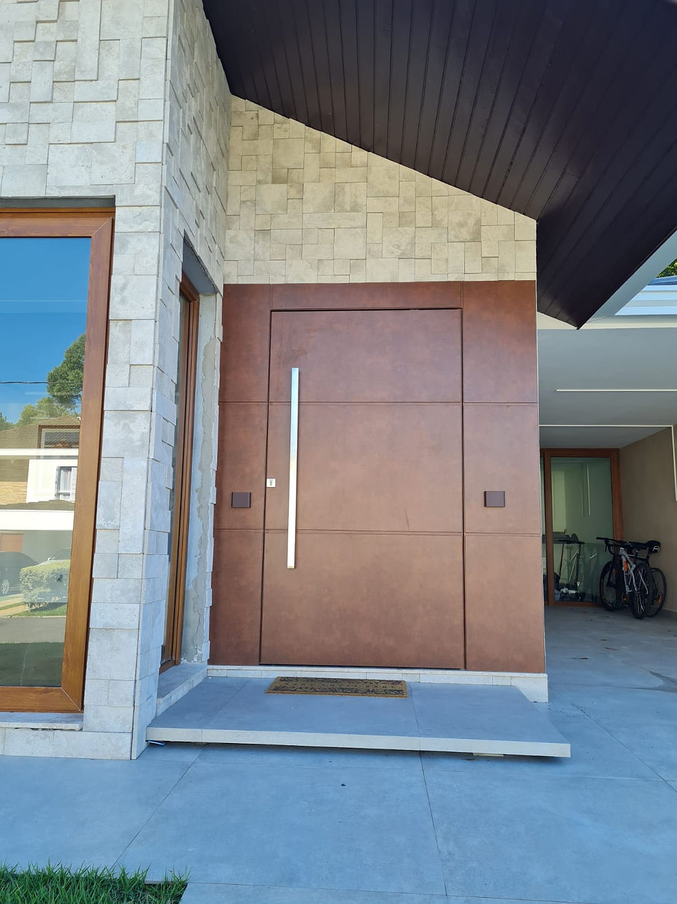 Exclusive Corten pivoting door