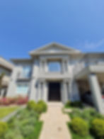 Celebrity house with black modern door