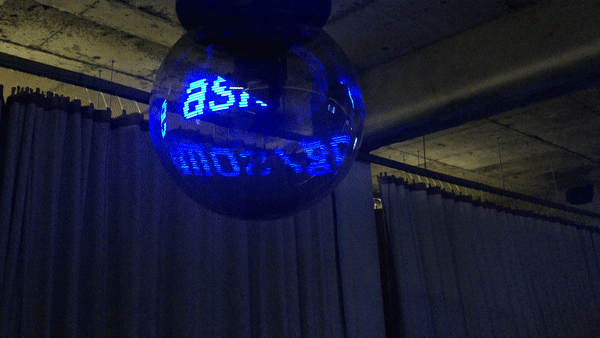 Detail: Seendosi, "Eight Coloured Beads", 2018, LED Mirror Balls, Carpet, Stencil on Wall.