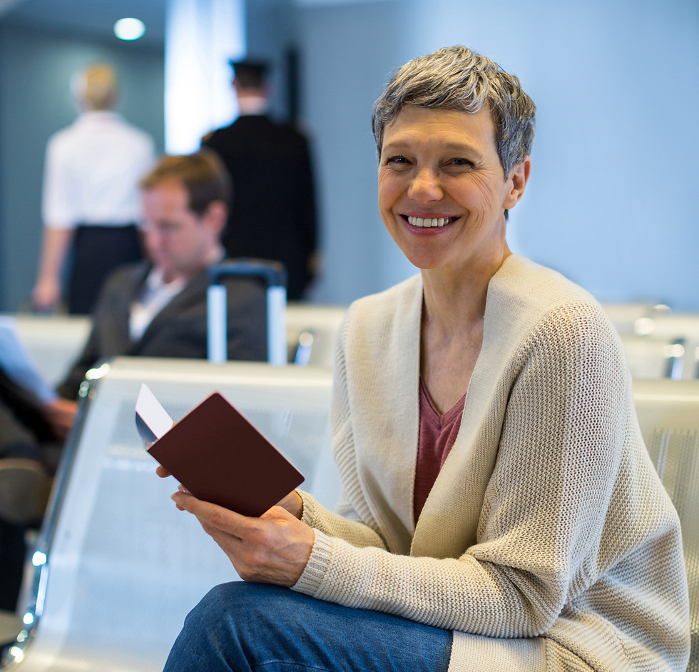 portrait-smiling-woman-with-passport-sitting-waiting-area.jpg