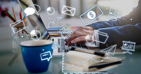 Digital marketing icons over person working on laptop