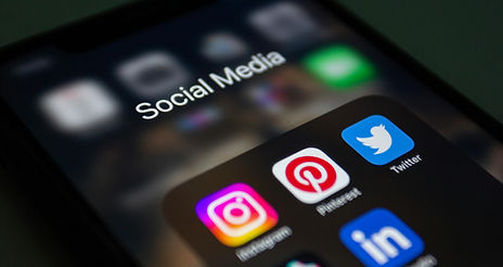 Social media icons on a smartphone screen