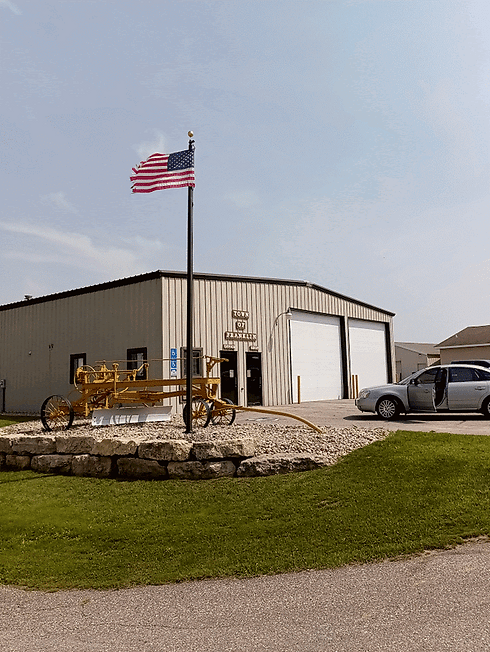 Town of Franklin Town Hall with flag waving.