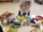 students chopping vegetables