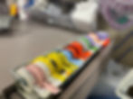 colorful anesthesia syringe labels on work station in operating room