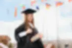educational-theme-graduating-student-girl-academic-gown.webp