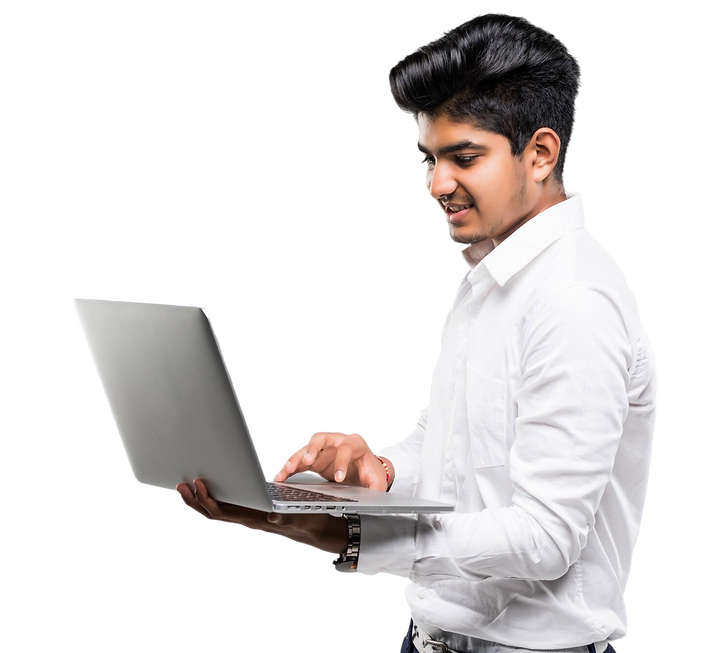 young-indian-man-with-laptop-gray-wall.png